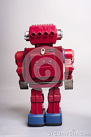 Old toy from the 1950s of a lonely and paradi robot made of red tin battery operated Stock Photo