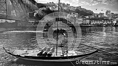 Old traditional boats with wine barrels, Porto. Stock Photo