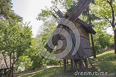 Old traditional romanian windmill Stock Photo