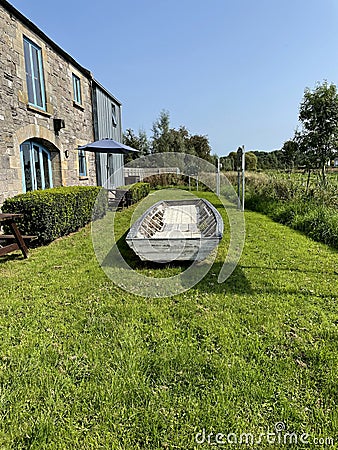 Old traditional wooden boat in Clones, Ulster Canal Stores Stock Photo