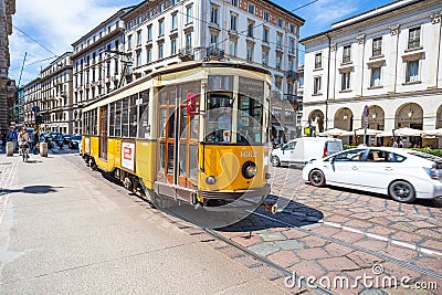 The old and traditional yellow tram in Milan, Italy Editorial Stock Photo