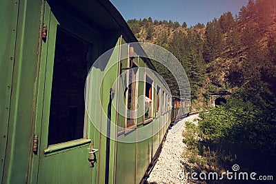 Old train entering tunnel Stock Photo