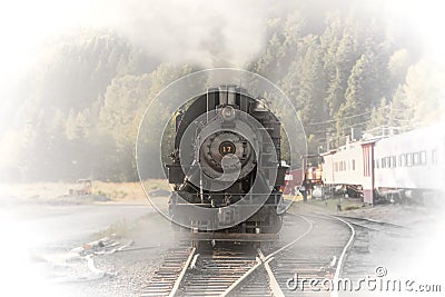 Old train steam engine with steam released Editorial Stock Photo