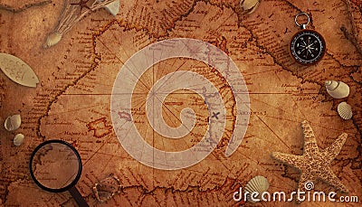 Old treasure map concept. Magnifier, compass and sea decorations on the map Stock Photo