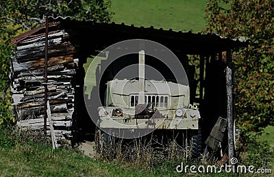 Old truck wreck abandoned under the roof Stock Photo