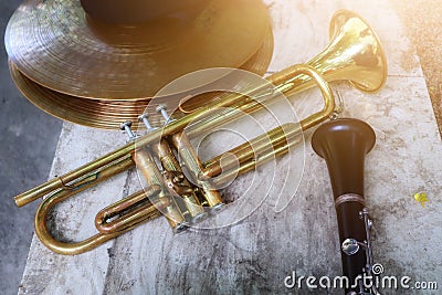 Old trumpet instrument Vintage jazz musical instrument background. Stock Photo