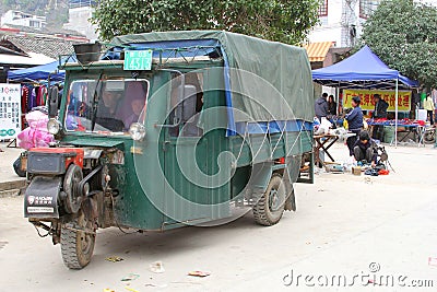 Retro tuktuk is a means of transport,Guilin, China Editorial Stock Photo