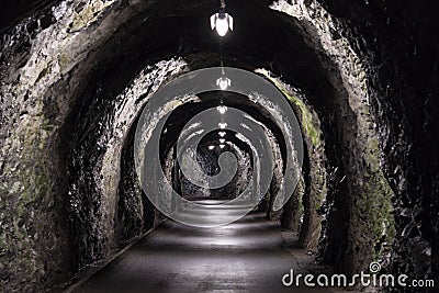 Old basic tunnel in the Swiss Alps near Bad Ragaz Stock Photo