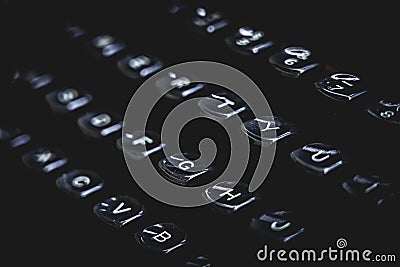 Old typewriter keys and letters. Black moody concept Stock Photo