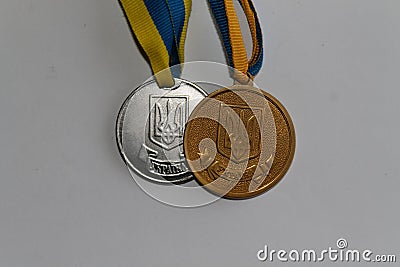Old Ukraine gold and silver medals for excellence in high school graduation - back side Editorial Stock Photo