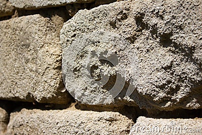 Old uneven crumbling brick, wall - background Stock Photo