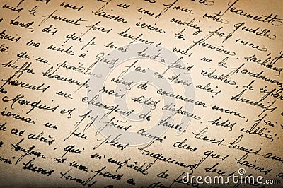 Old unreadable handwritten text aged paper texture background Stock Photo