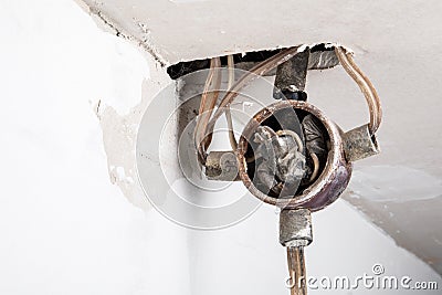 Old and unsafe wiring. Security, regulation and standards. construction site Stock Photo