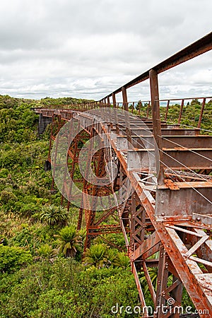 Old unused iron train bridge at the Old Coach Road, New Zealand Stock Photo