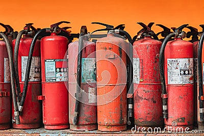 old used abandoned damaged expired fire extinguisher tank danger unsafety for prepared to destroy and recycle Stock Photo