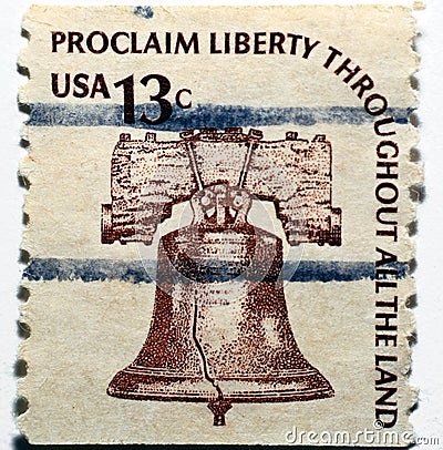 Old used American postage stamp printed in the USA from the Americana issue shows the liberty bell circa 1975 Editorial Stock Photo