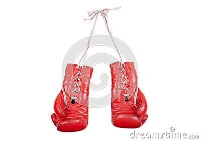 Old used and battered red leather boxing gloves isolated on white background Stock Photo