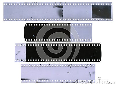 Old, used, dusty and scratched celluloid film strips Stock Photo