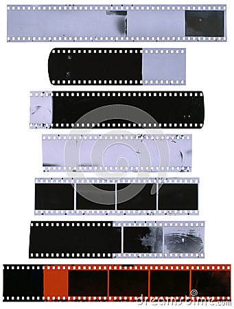 Old, used, dusty and scratched celluloid film strips Stock Photo