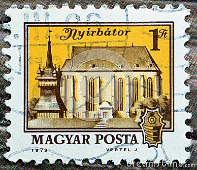 Old used Hungarian Magyar posta stamp 1979 features nyirbator NyÃ­rbÃ¡tor cityscape in Hungary Editorial Stock Photo
