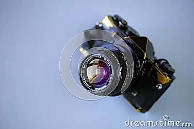 old used Olympus OM-1 film camera and Olympus 35mm 2.8 shift lens, for perspective contr Editorial Stock Photo