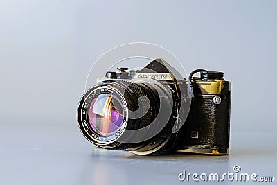 old used Olympus OM-1 film camera and Olympus 35mm 2.8 shift lens, for perspective contr Editorial Stock Photo