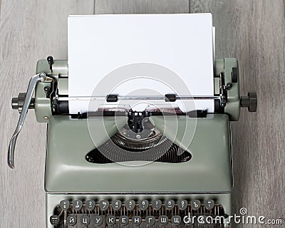 The old used printing machine with the marks of use on the textured backing Stock Photo