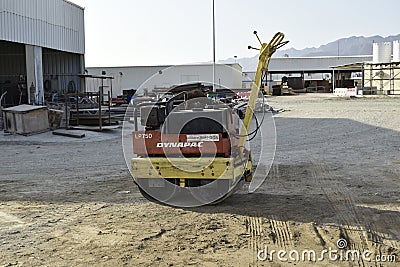 Old used roller machine in the work shop muscat, oman Editorial Stock Photo