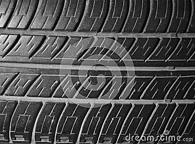 Old used second hand black car tyre texture motif pattern Stock Photo