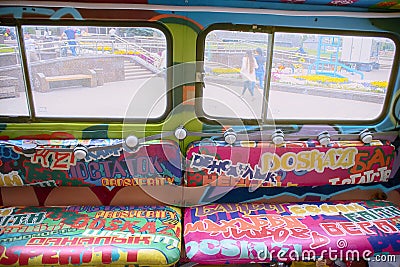 Old van decorated with graffiti and lights Editorial Stock Photo