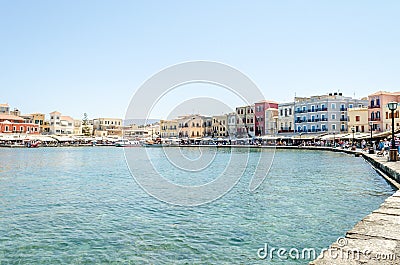 Beautiful Bay at the Old Venetian Harbour in Chania, Crete, Greece. Tourists and Locals Walking all Along the Coastline Editorial Stock Photo