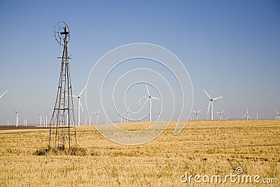 Old versus new windmills Stock Photo