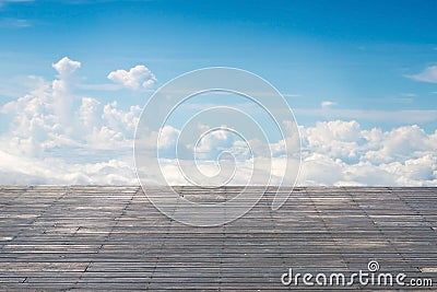 Old vertical striped wooden terrace with sunny sky cloudscape Stock Photo