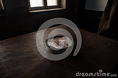 Old and vintage blank clock dial without hand on old wooden table Stock Photo