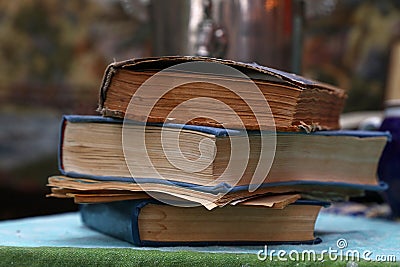 Old vintage books and booklets on table close up Stock Photo