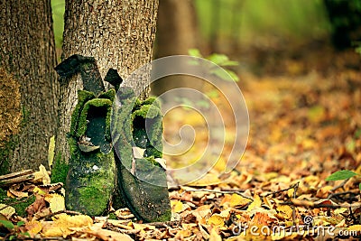 Old vintage boots in autmn leaves Stock Photo