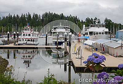 Old vintage excursion ships in the harbor. Walks by the sea. Cruise. Travel in the summer. Vancouver, British Columbia, Canada Editorial Stock Photo