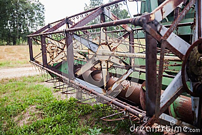 Old vintage farming agricultural harvester Stock Photo