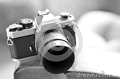 Old Vintage Film Camera with Manual Focus Lens Stock Photo