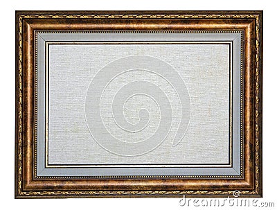 Old vintage golden wood picture frame with blank white canvas Stock Photo