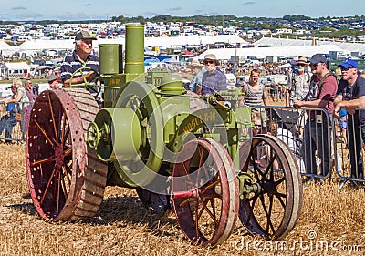 Old vintage green mogual 8-16 tractor at show Editorial Stock Photo