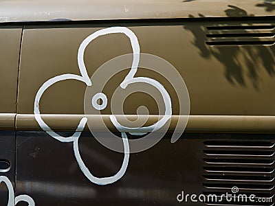 An old vintage hippie peace and love van flower power Stock Photo