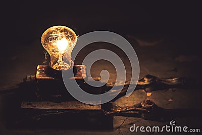 Old vintage light bulb web fade out dark copy space concept old idea power saving technology Stock Photo