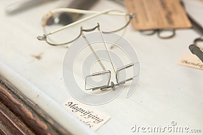 An old vintage magnifying spectacles Editorial Stock Photo