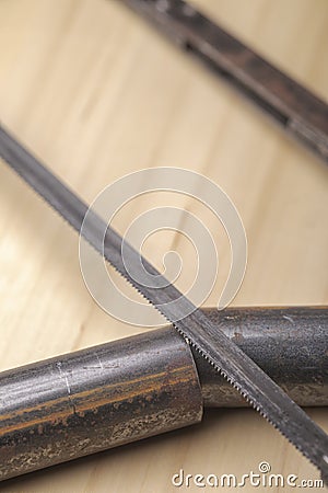 Old vintage metal hacksaw blade close up Stock Photo