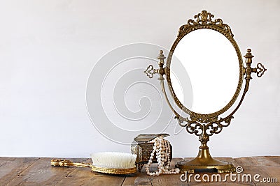 Old vintage oval mirror and woman toilet fashion objects Stock Photo