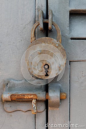 Old vintage padlock - closed metal door Stock Photo