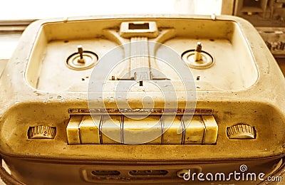 Old vintage player of reels. The antique Reel-to-Reel. Tape Recorder with spools. Bobbin tape recorder Stock Photo