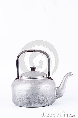 Old vintage retro Kettle on white background drink (front view). Which, kettle made of aluminum materials. Stock Photo