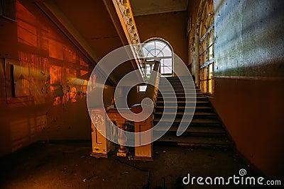 Old vintage staircase at the old abandoned building Stock Photo